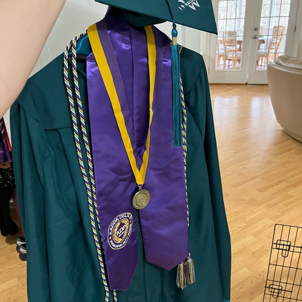 Walden University master’s degree cap & gown and college gear